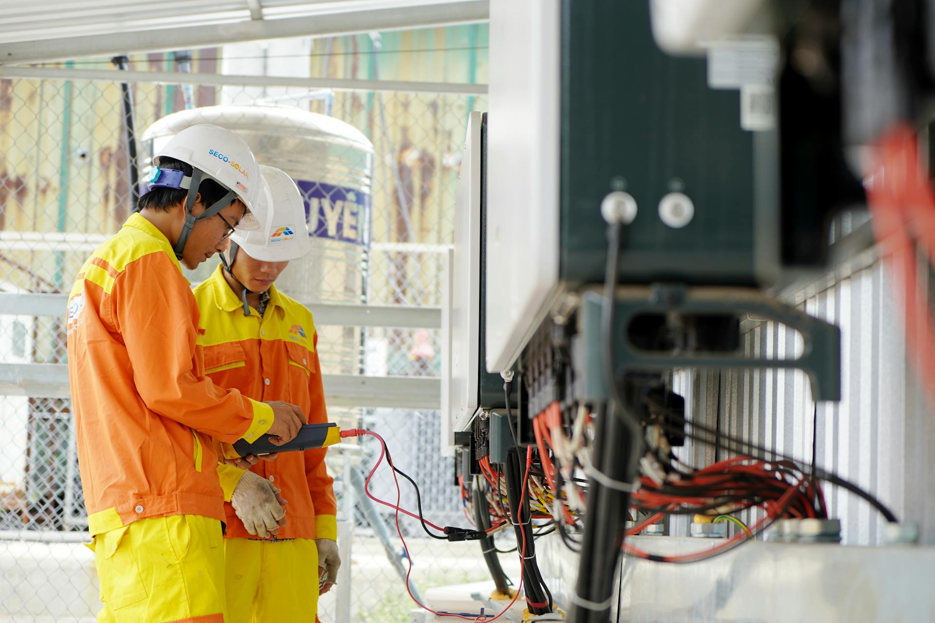 Men Working with Electrical Wires