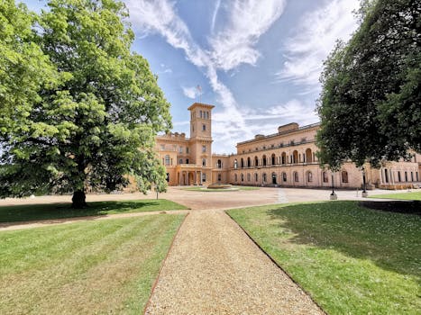 Stunning view of Osborne House and gardens in East Cowes, UK, showcasing renaissance architecture.
