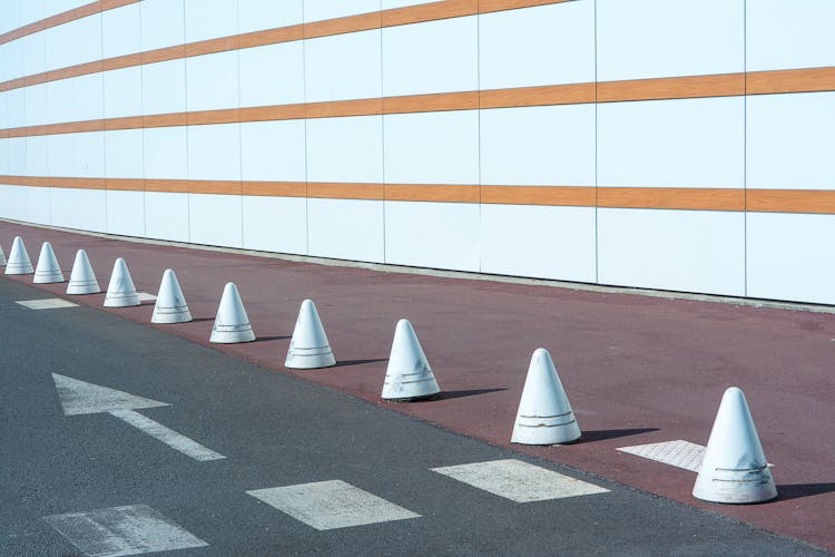 Row Of Traffic Cones On Side Of Road