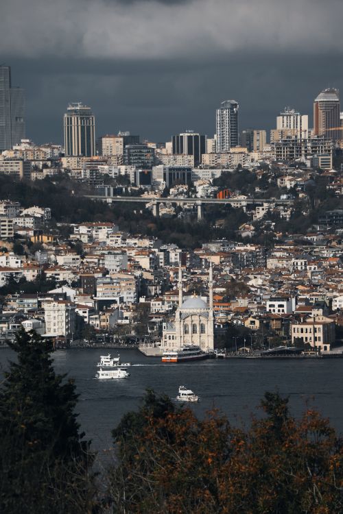 Free A stunning view of Istanbul's cityscape with the Bosphorus Strait and Ortaköy Mosque. Stock Photo