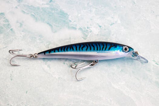 A close-up of a blue mackerel fishing lure on icy background, perfect for anglers.