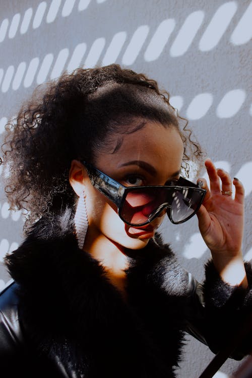 A Woman Wearing Black Sunglasses