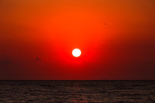 Stunning red sunset over the sea in İskenderun, Turkey.