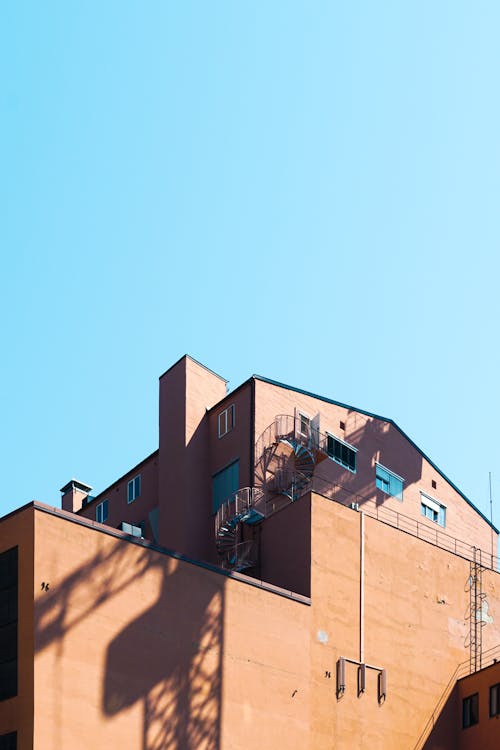 Gray Concrete Building Exterior With Geometric Design · Free Stock Photo