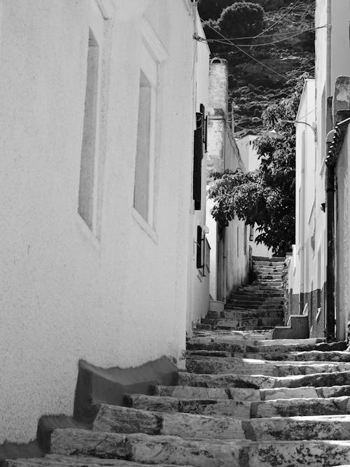 Narrow Alley with Stairs in Old Town