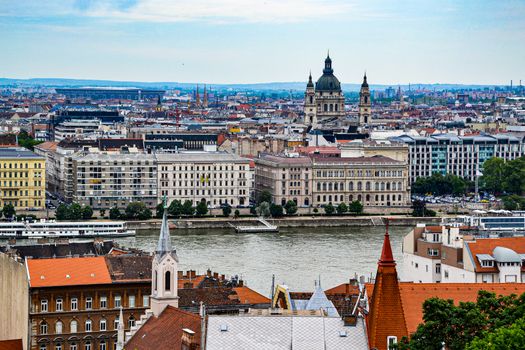 Stunning view of Budapest cityscape featuring historic architecture along the Danube River.