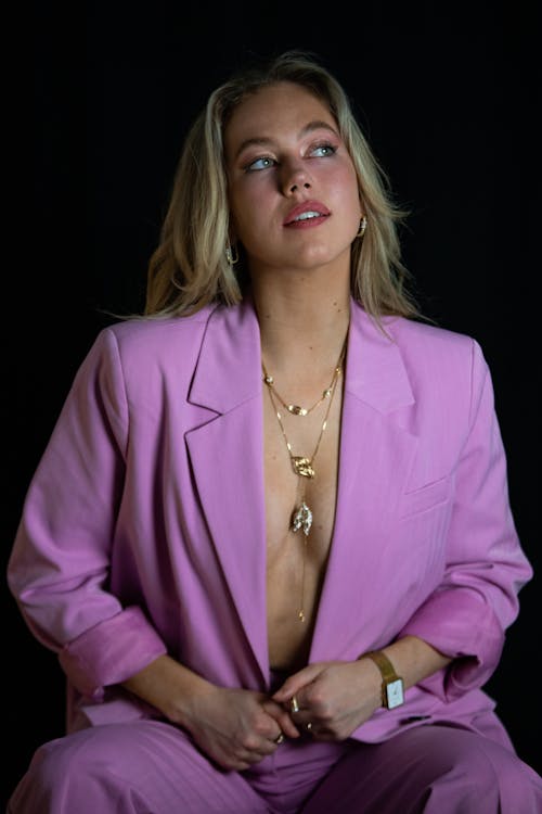 A Woman in a Pink Suit 