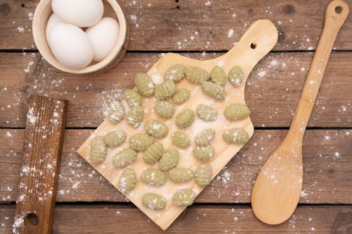 Dumplings on a Wooden Cutting Board