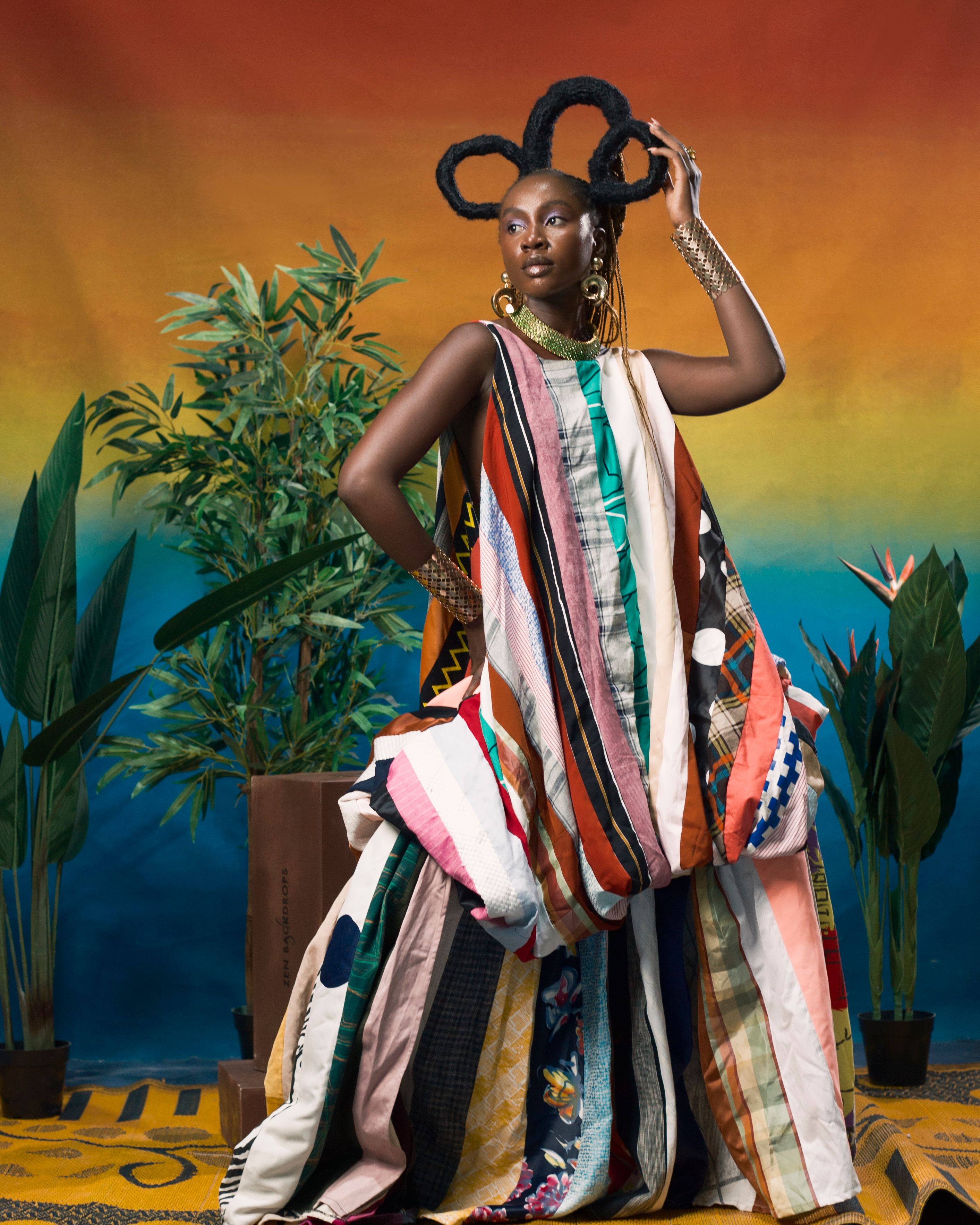 Model Posing in a Colorful Traditional Dress · Free Stock Photo