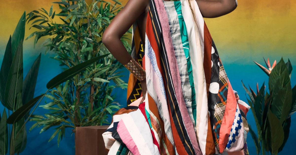 Model Photo Tradition Model Posing in a Colorful Traditional Dress · Free Stock Photo