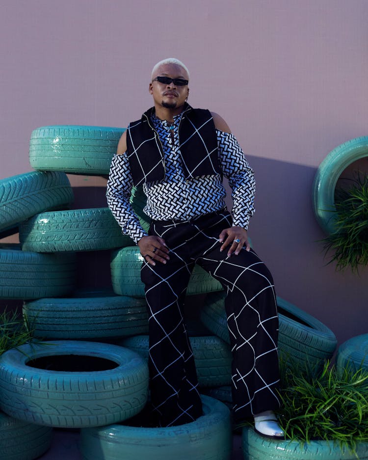 Man Posing On Tires