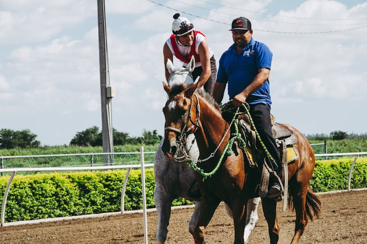 Photo Of Men Riding Horses