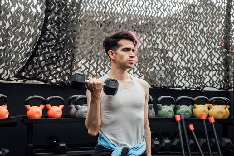 A Man Lifting Dumbbell