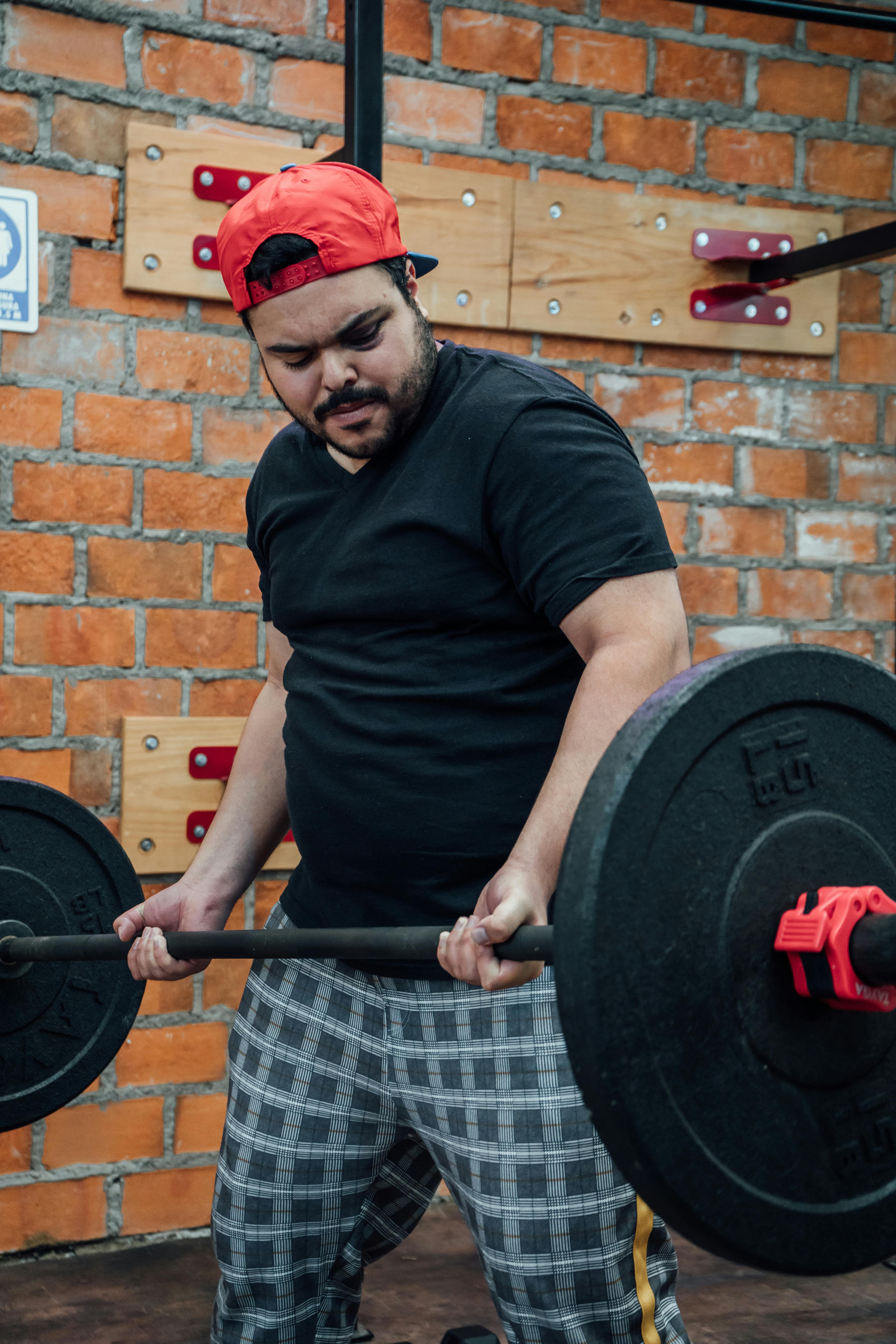 A Man Lifting Weights T-Shirt