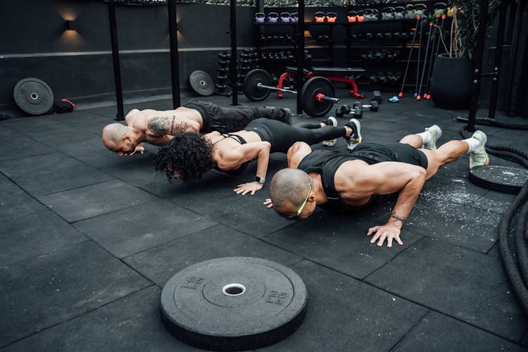 People Doing Push Ups Together