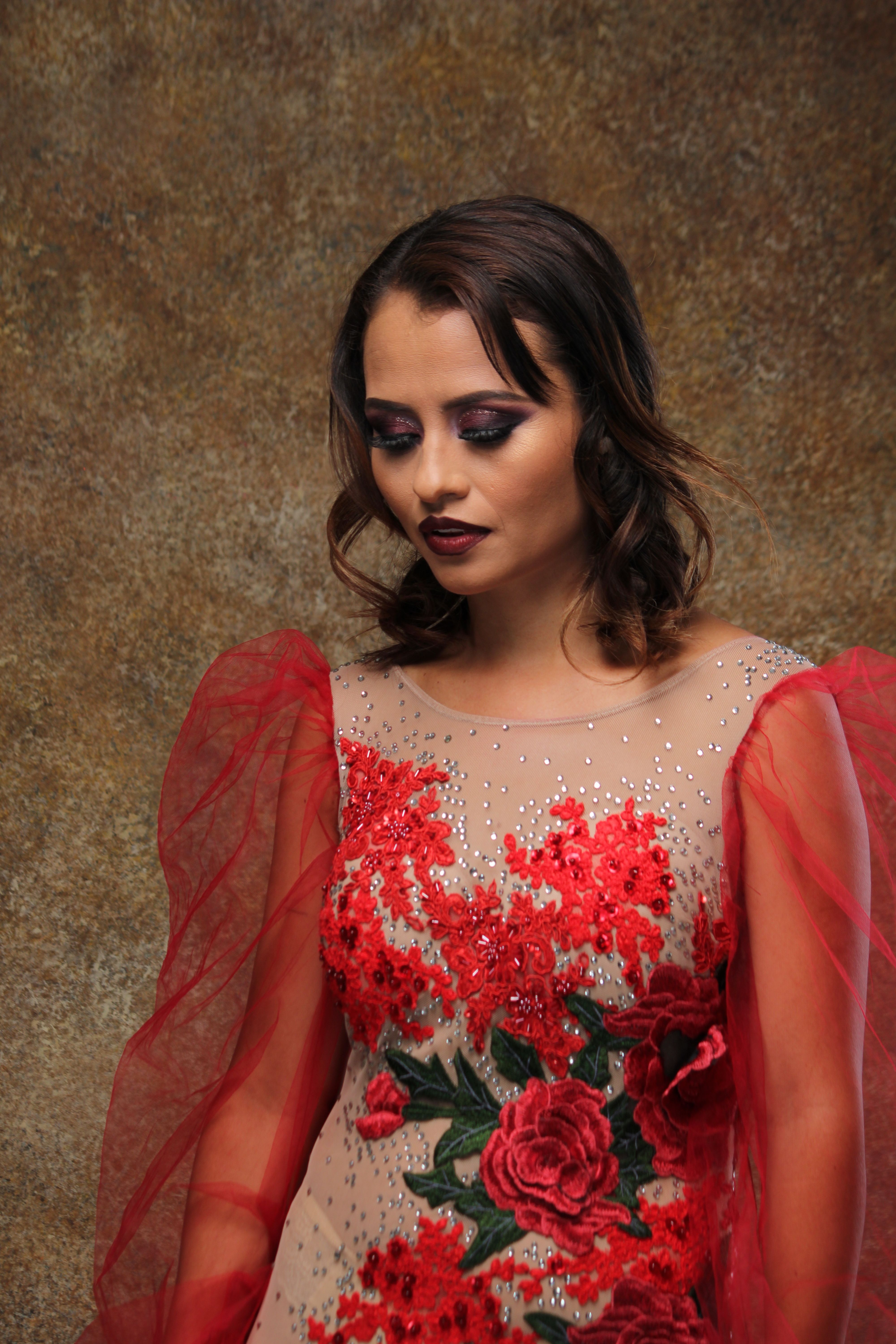 Woman Wearing a Red and White Floral Dress · Free Stock Photo
