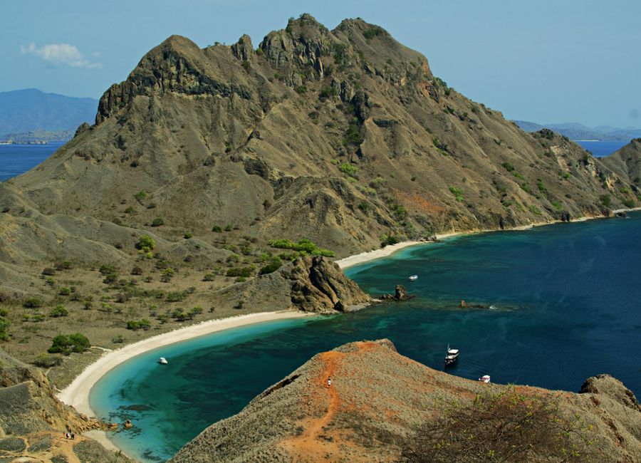 A breathtaking view of the unique topography and vibrant waters of Padar Island in Indonesia's Komodo National Park.