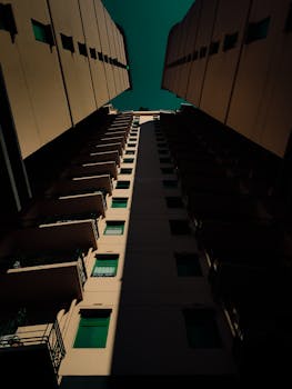 Striking low angle view of symmetrical buildings in Singapore with moody lighting.