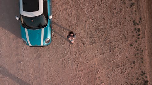 Aerial Shot Of Person And Car