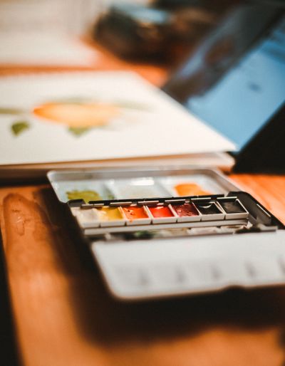 Watercolour wash on paper, photo by Sarah Films on Pexels