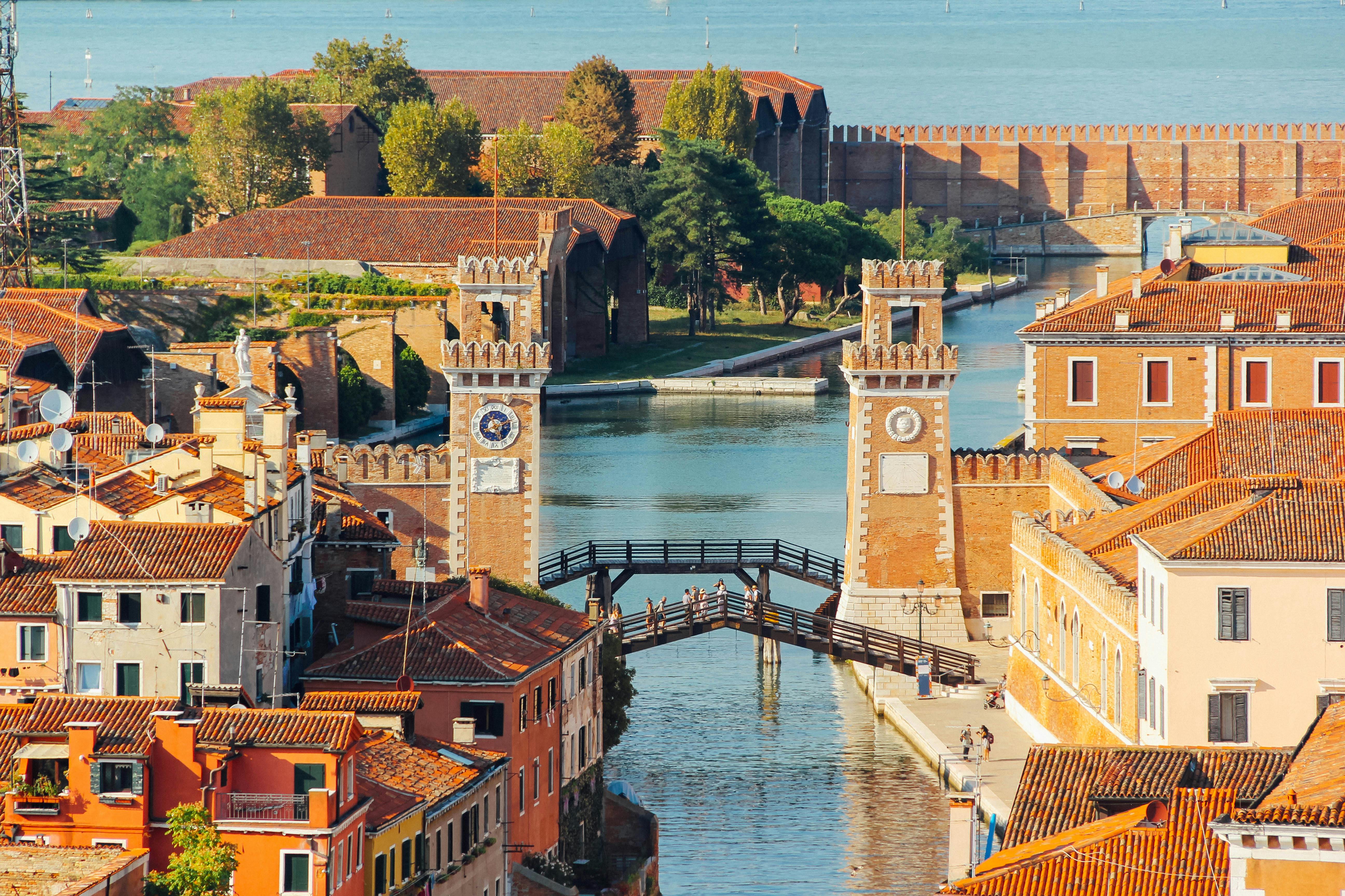 brown concrete buildings and bridge