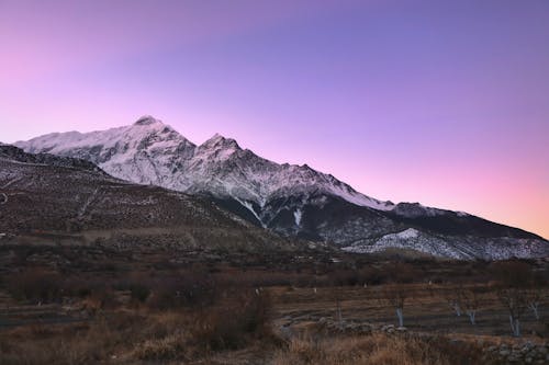 Snowcapped Mountains at Dusk 