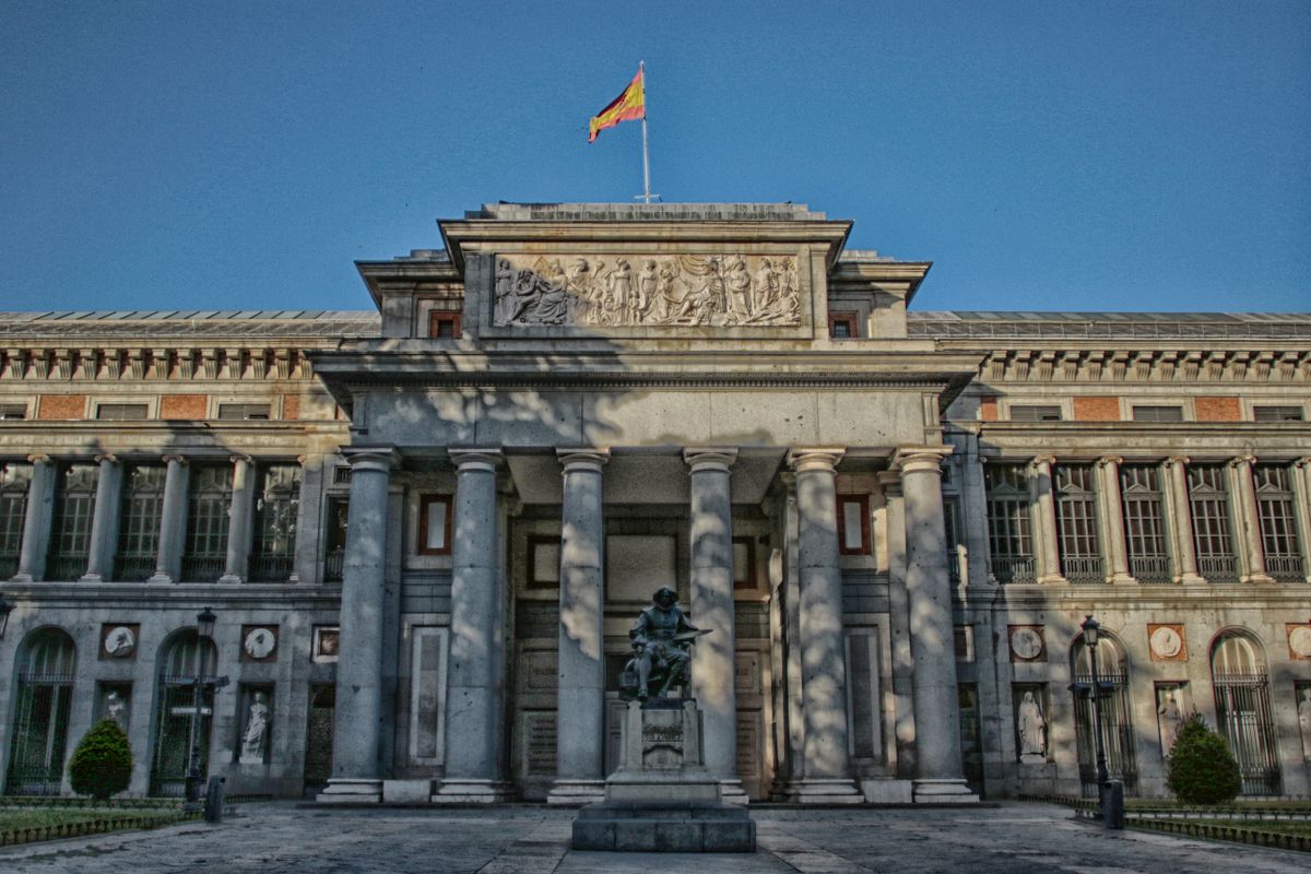 The exterior of the Prado Museum with the statue in front of the entrance, Madrid