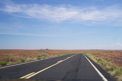 Asphalt Road Through the Desert Countryside