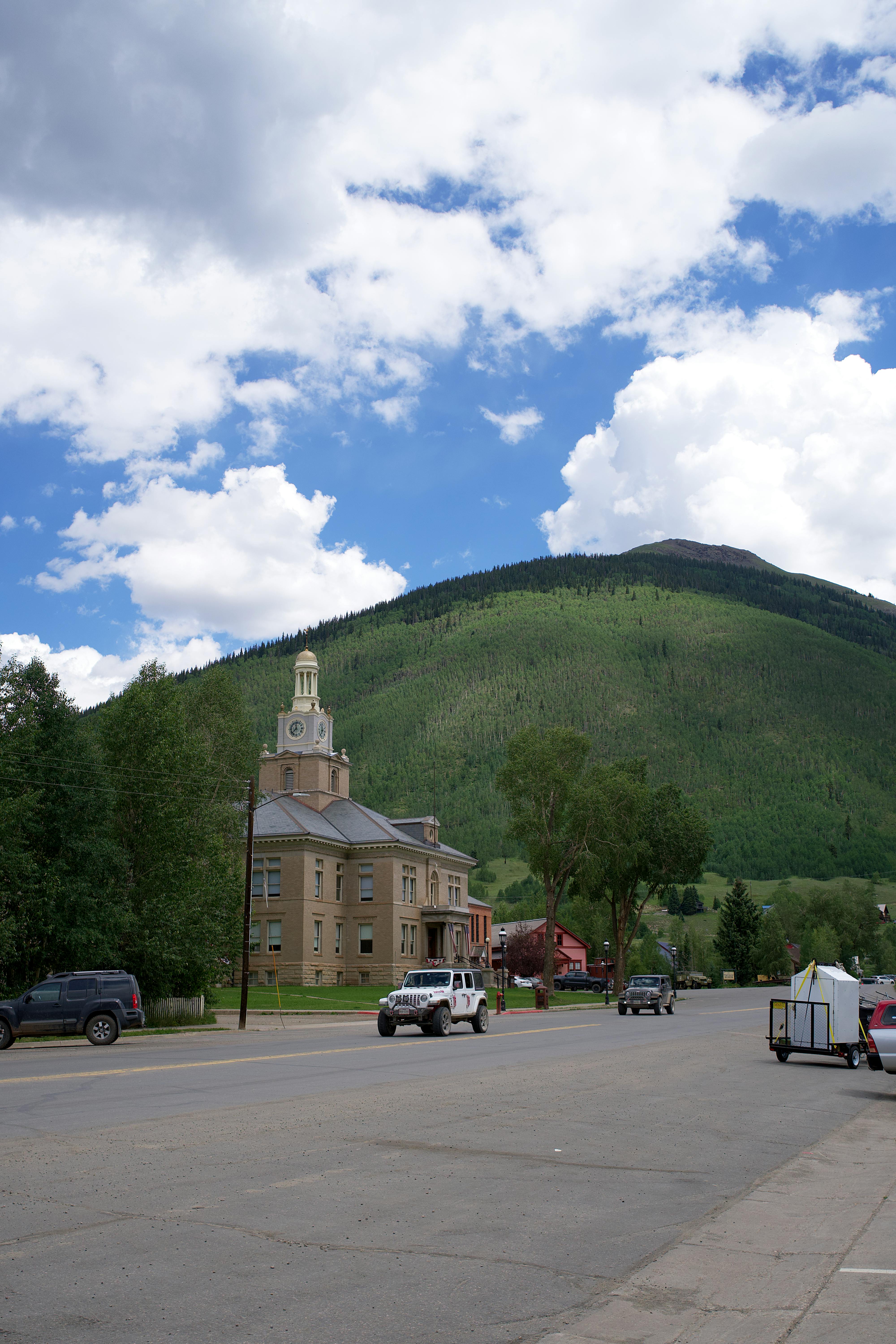 traffic on the street in front of the san juan county courthouse in silverton