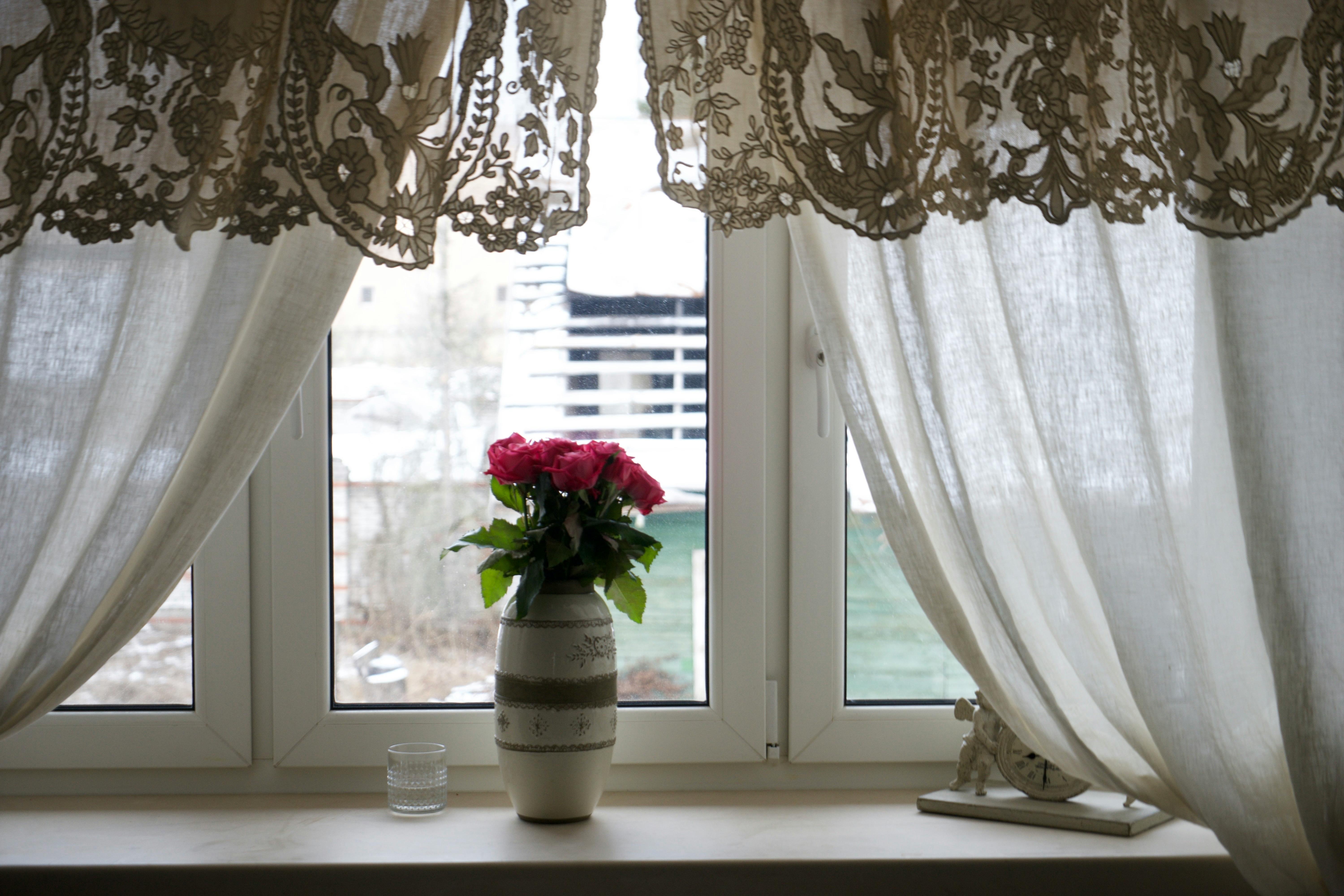 Polyester Lace Curtains With Floral Patterns In A Home Interior Setting