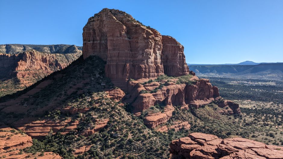 Unbeatable Secret Wilderness Sedona Helicopter Sunset Tour Review: The Ultimate Guide to Sedona's Most Breathtaking Aerial Experience Review 2026 - Breathtaking view of red rock formations under a clear blue sky in Sedona, Arizona.