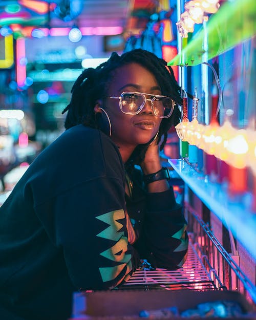 Woman in Sweatshirt with Hand in Hair