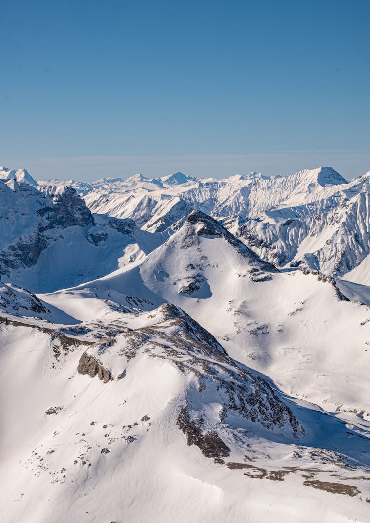 Aerial Photography Of Snow Capped Mountains