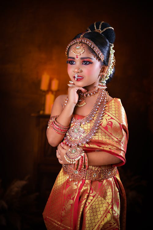 Young Girl Wearing Ornate Jewellery and Sari