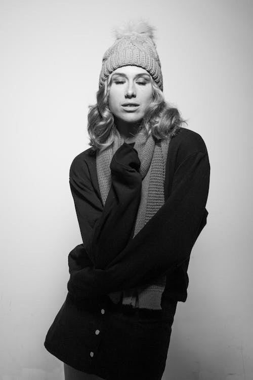 Model Posing in Knit Hat and Scarf