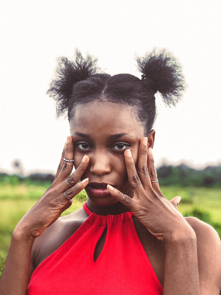 Woman With Hands On Face