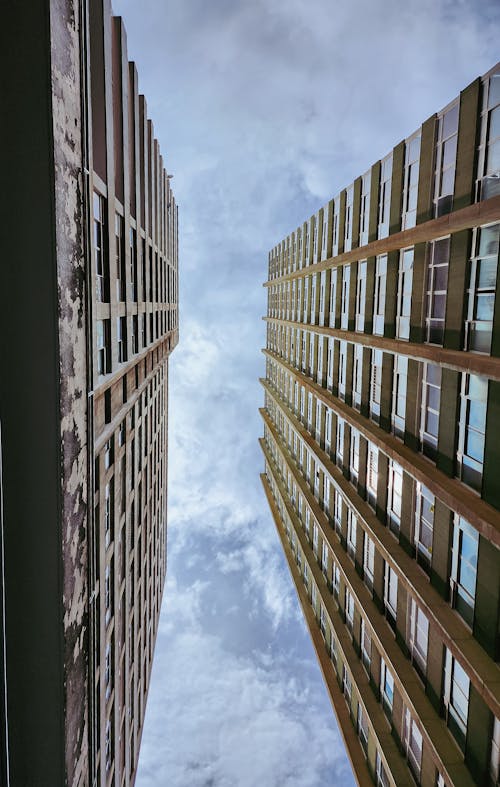 High Rise Buildings Under Cloudy Sky