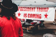 Person Standing Beside Canopy Tent