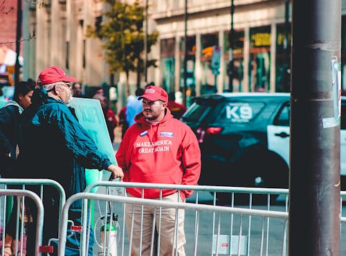 Man Placing His Hands on His Pocket