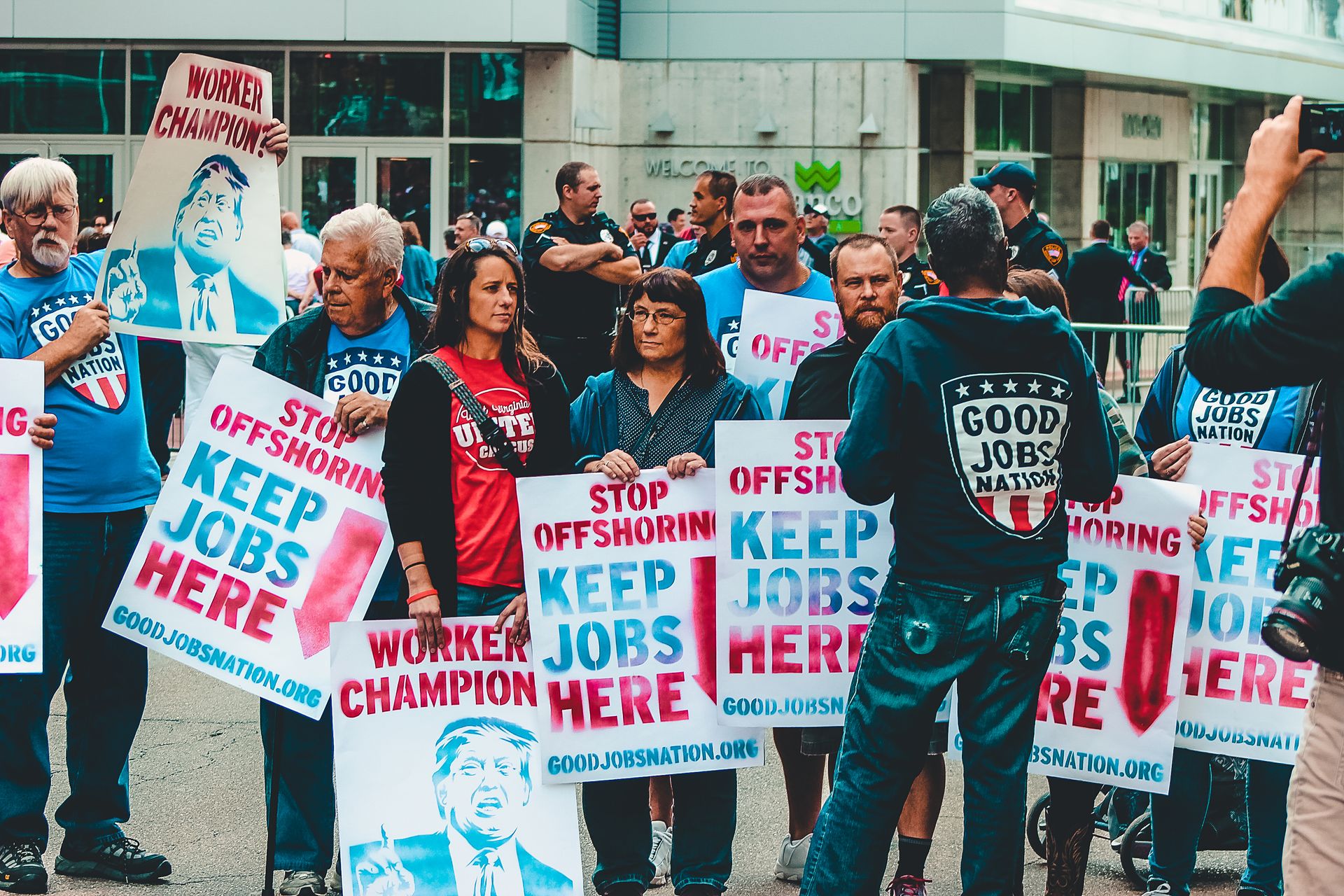 Group of People Holding Posters