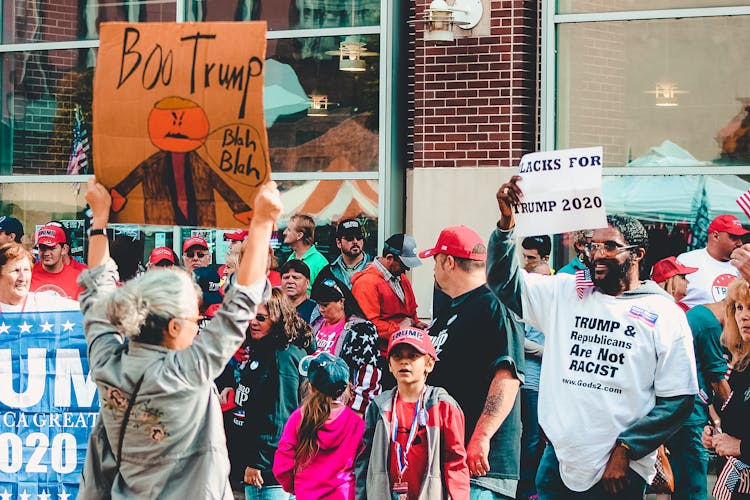 Man Holding Banner