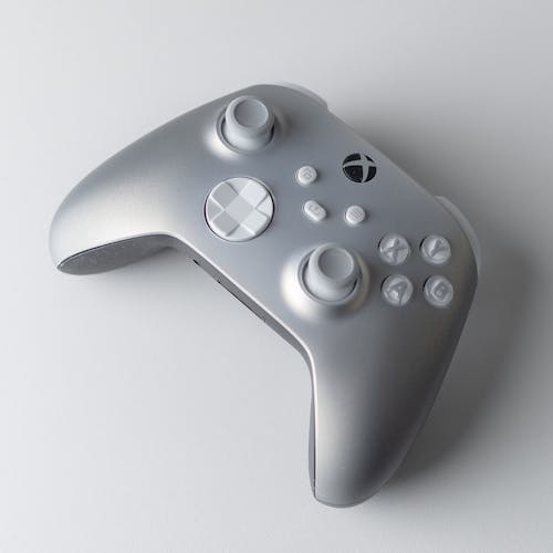 Gray and White Game Controller