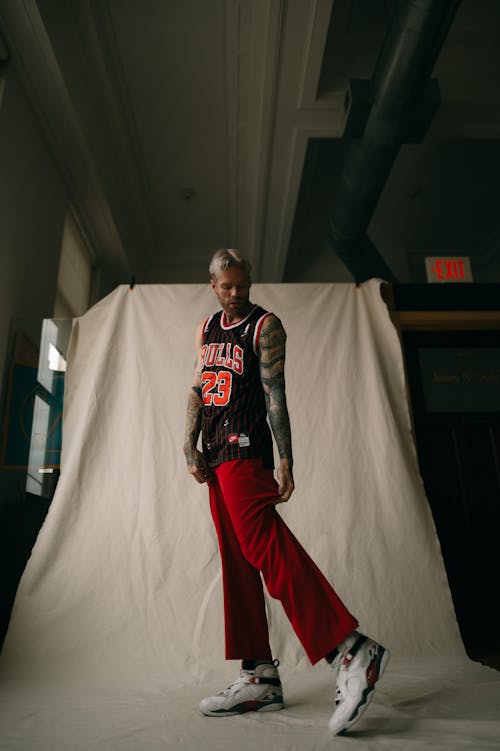 Man Posing in Basketball Tank Top