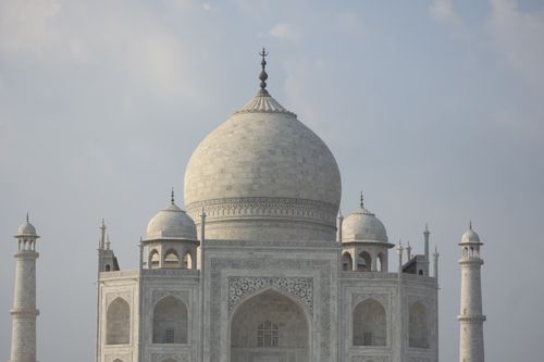 Free A stunning view of the Taj Mahal's marble dome showcasing Mughal architecture in Agra, India. Stock Photo