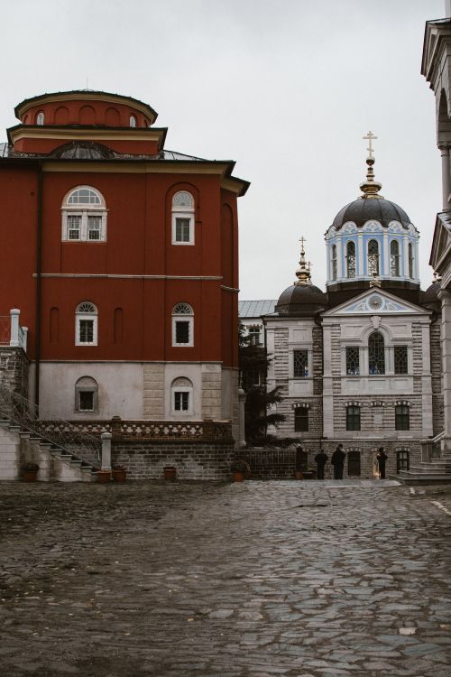 Free An urban scene capturing baroque architecture of an Orthodox church with striking colors. Stock Photo
