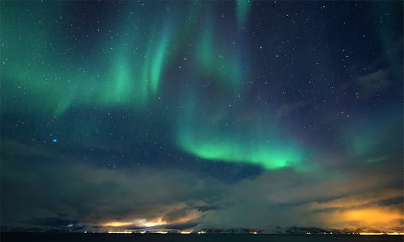Captivating view of the aurora borealis over Tromsø, capturing nature's night-time magic.