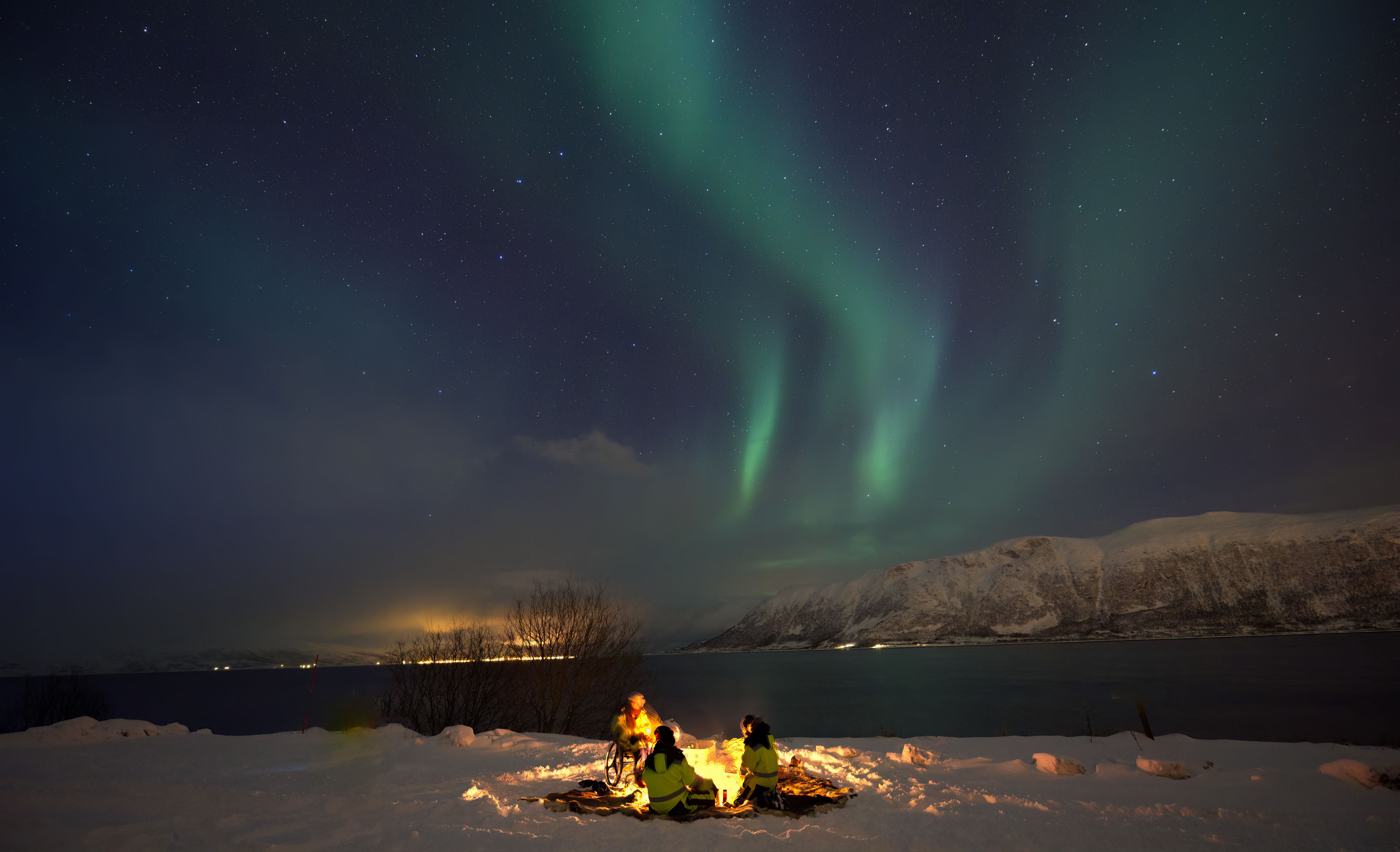 People Camping Beside a Lake Under Aurora Borealis Sky · Free Stock Photo