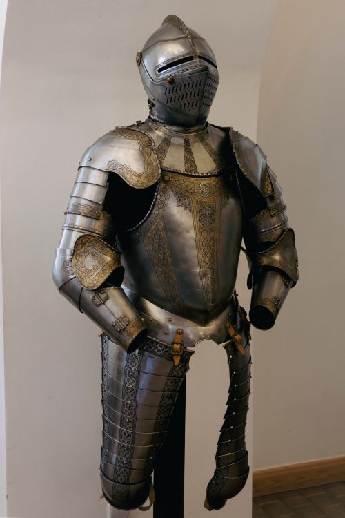 Free Intricate medieval knight armor showcased in a museum setting at Nesvizh, Belarus. Stock Photo