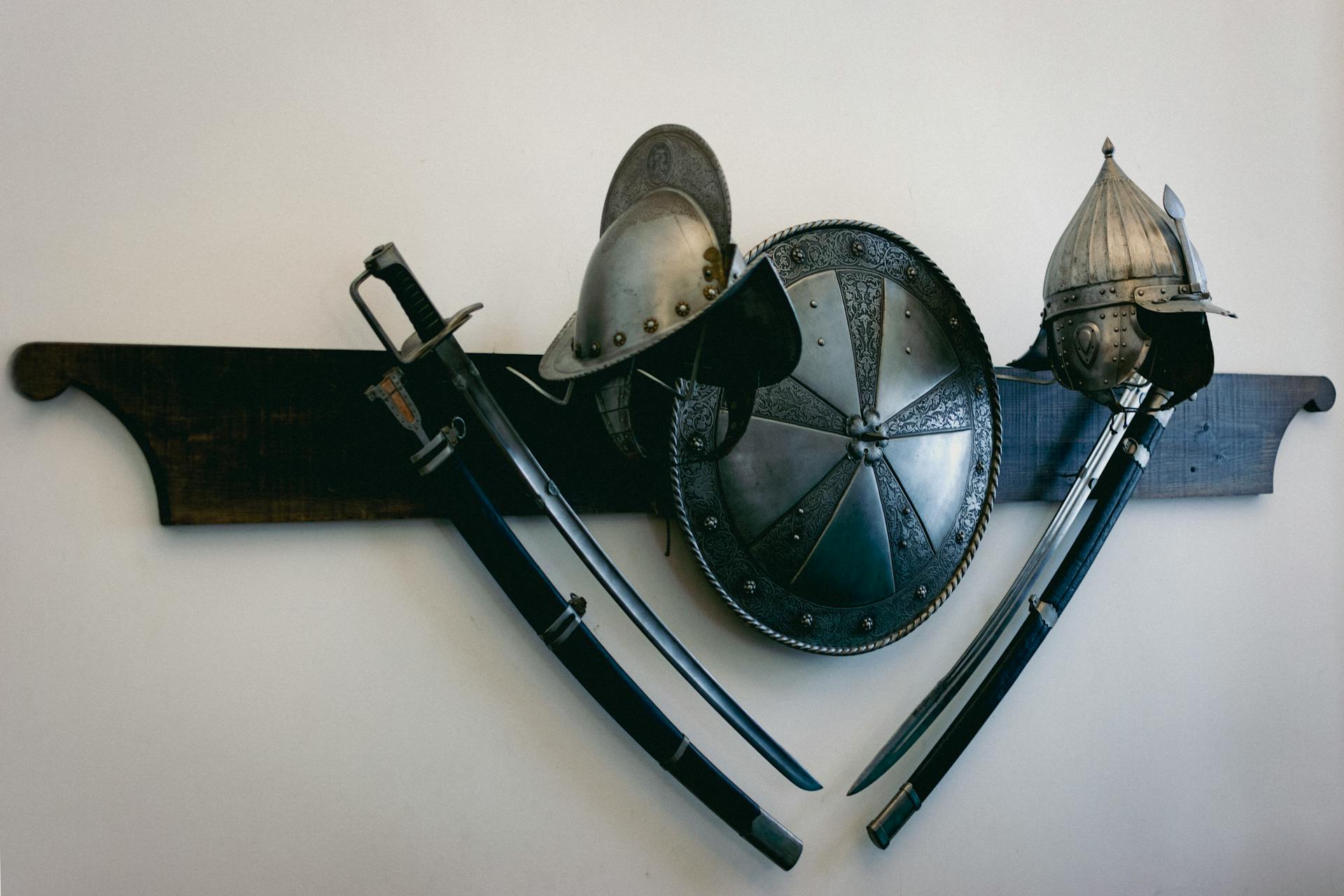 Swords, Helmets and Shield Hanging on Wall
