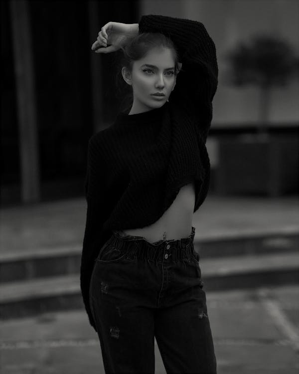 Grayscale Photo of Women in Sweater and Jeans · Free Stock Photo